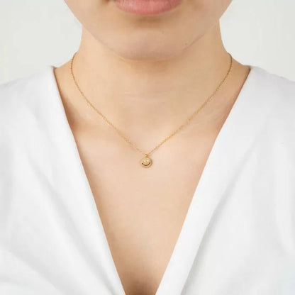 ketting smiley muntje met steentjes
